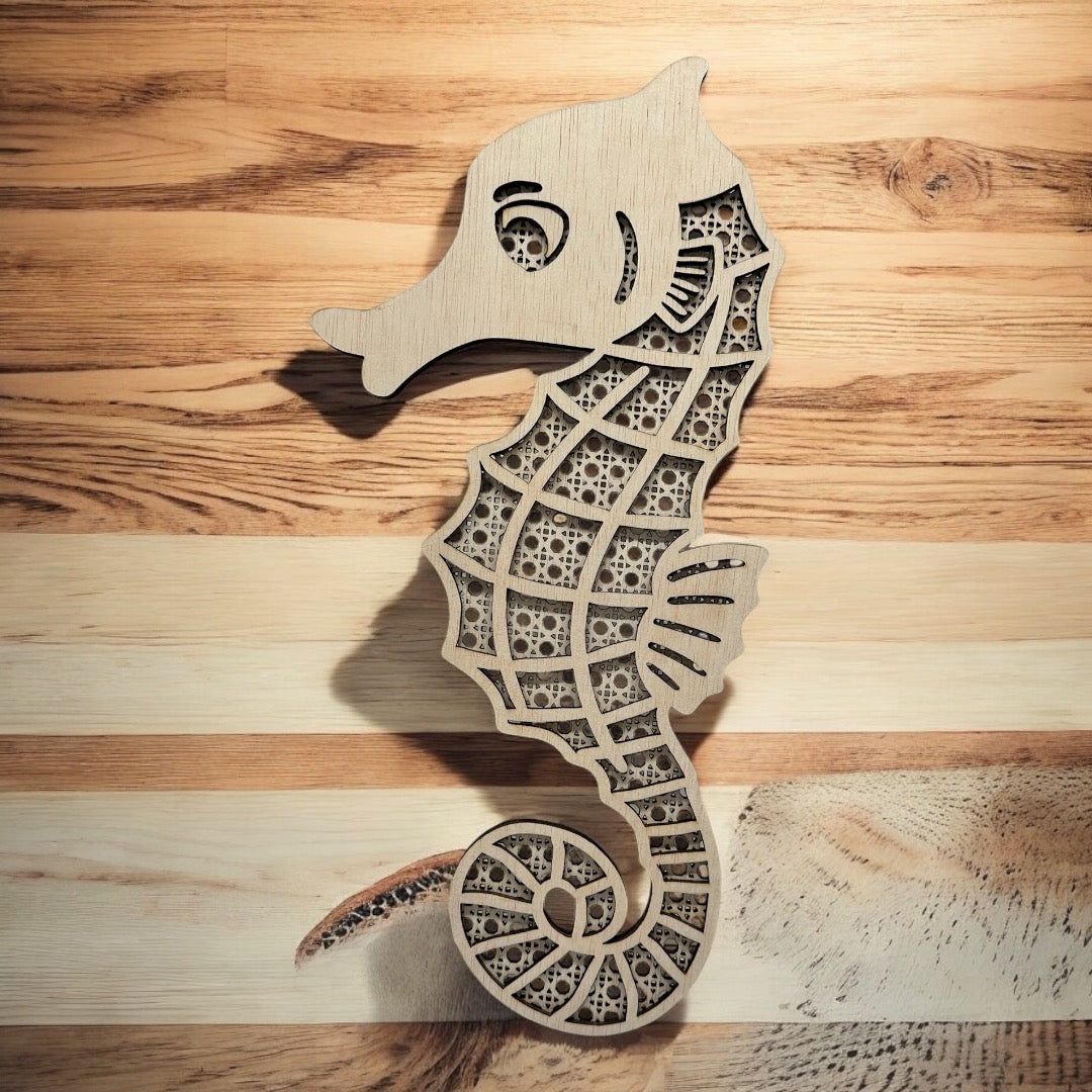 Wooden seahorse decorative item on a wooden surface