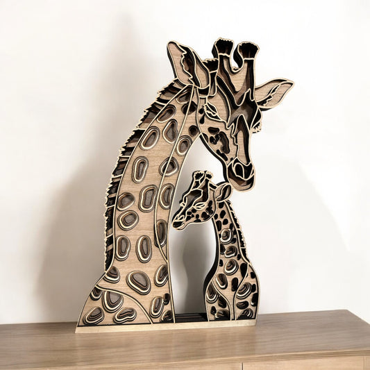 Wooden giraffe sculpture on a wooden surface with a plain background