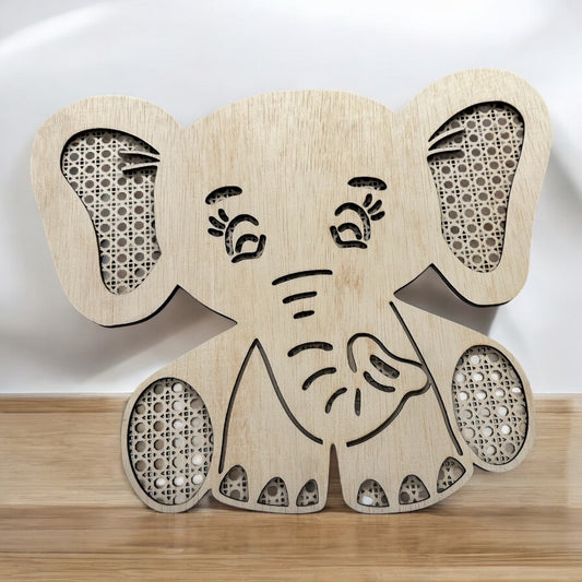 Wooden Rattan Elephant wall decor piece.