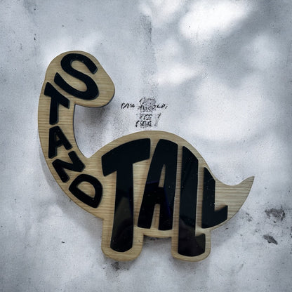 Wooden dinosaur shap with stand tall acrylic letters.