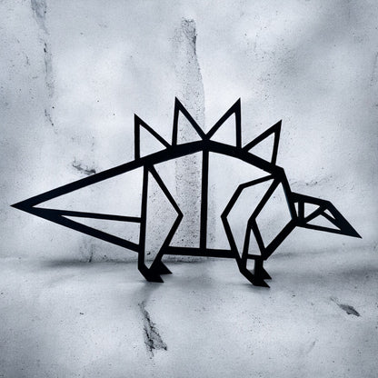 Geometric black stegosaurus wall decor on a textured gray surface